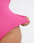 Long Sleeve Ribbed V Neck Bodysuit - Pink