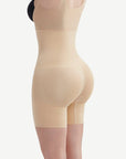A model wearing a beige full-body shaper that reaches mid-thigh.