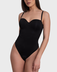 A black bustier corset bodysuit with adjustable straps and push-up effect, designed to highlight natural curves and create a silhouette.