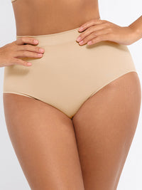 A high waisted beige shaping panty with a visible thong waistband.
