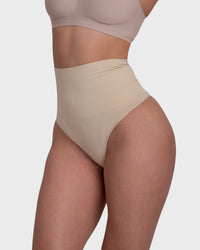 Shop Lily Tummy Control Shaping Thong Panties, телесна боја: обликувачки танги со висок струк за стомак – страничен поглед