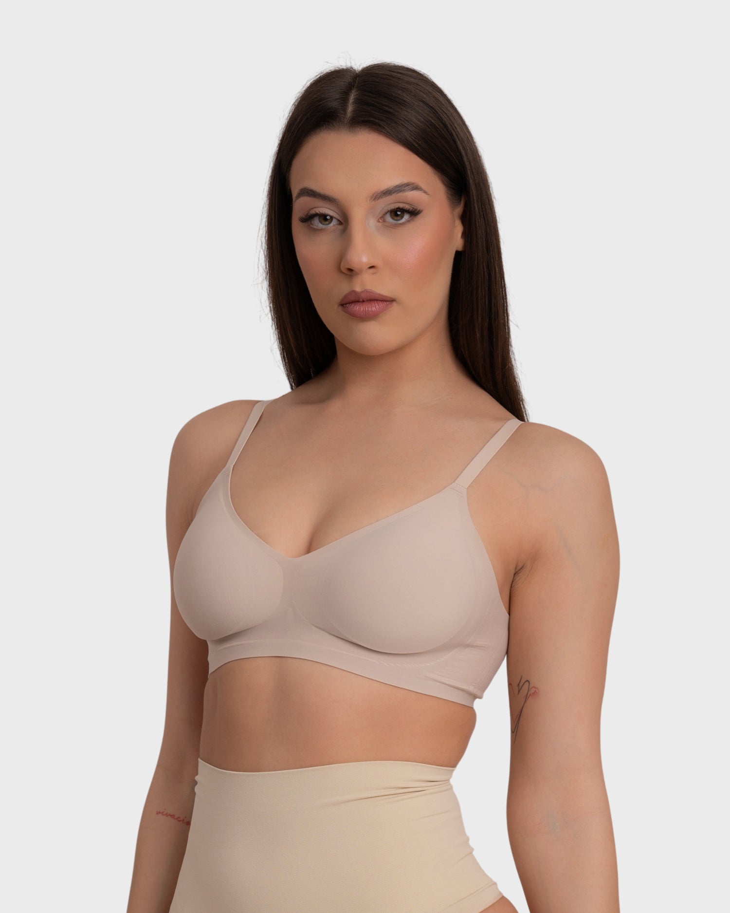 This image features the "Everyday Comfort Push Up Bra" in a nude hue, designed for optimal comfort and a subtle push-up effect. The bra is crafted with soft, elastic fabric that contours seamlessly to the body, providing a discreet and supportive lift.