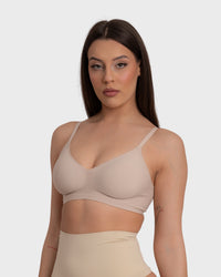This image features the "Everyday Comfort Push Up Bra" in a nude hue, designed for optimal comfort and a subtle push-up effect. The bra is crafted with soft, elastic fabric that contours seamlessly to the body, providing a discreet and supportive lift.